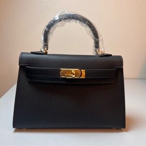 Genuine Epsom Leather mini handbag with shoulder strap featuring Gold hardware
